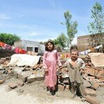 Children after flooding in Pakistan.