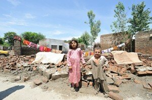 Children after flooding in Pakistan.